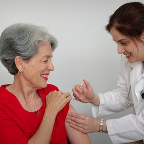 senior citizen getting flu shot